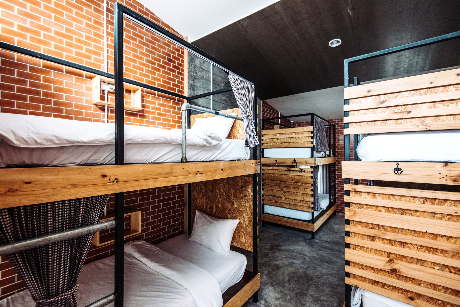 Dormitory room with bunk beds in the modern hostel